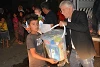 Le responsable de mission CSI aide à distribuer les dons humanitaires à Dohuk (Kurdistan en Irak). (csi)