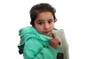 Une fille yézidie parmi les 324 enfants déplacés dans le camp « Esian » qui ont reçu une veste d’hivers ; tous ces enfants sont orphelins, parfois de père et de mère. (csi)